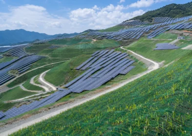 Mountain PV plant eco-restoration area covered with green camouflage netting