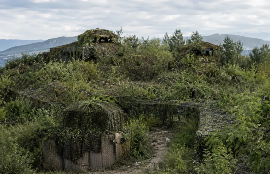 Fixed reconnaissance position renovated with full camouflage net cover