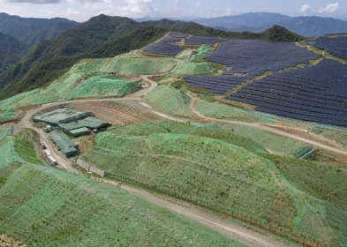 Highland PV construction area concealed with green ecological camouflage nets