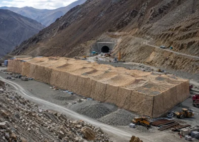 Lhasa highway construction material yard covered with camouflage netting